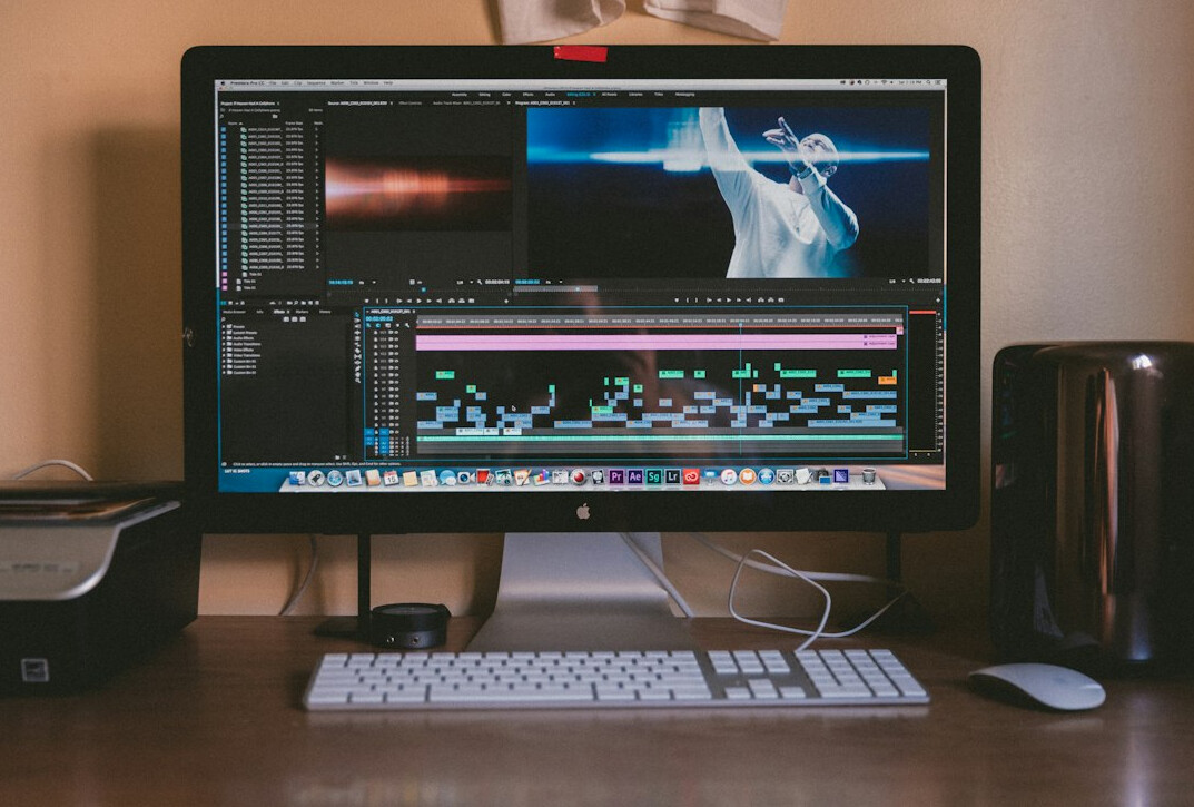 video editor working on computer