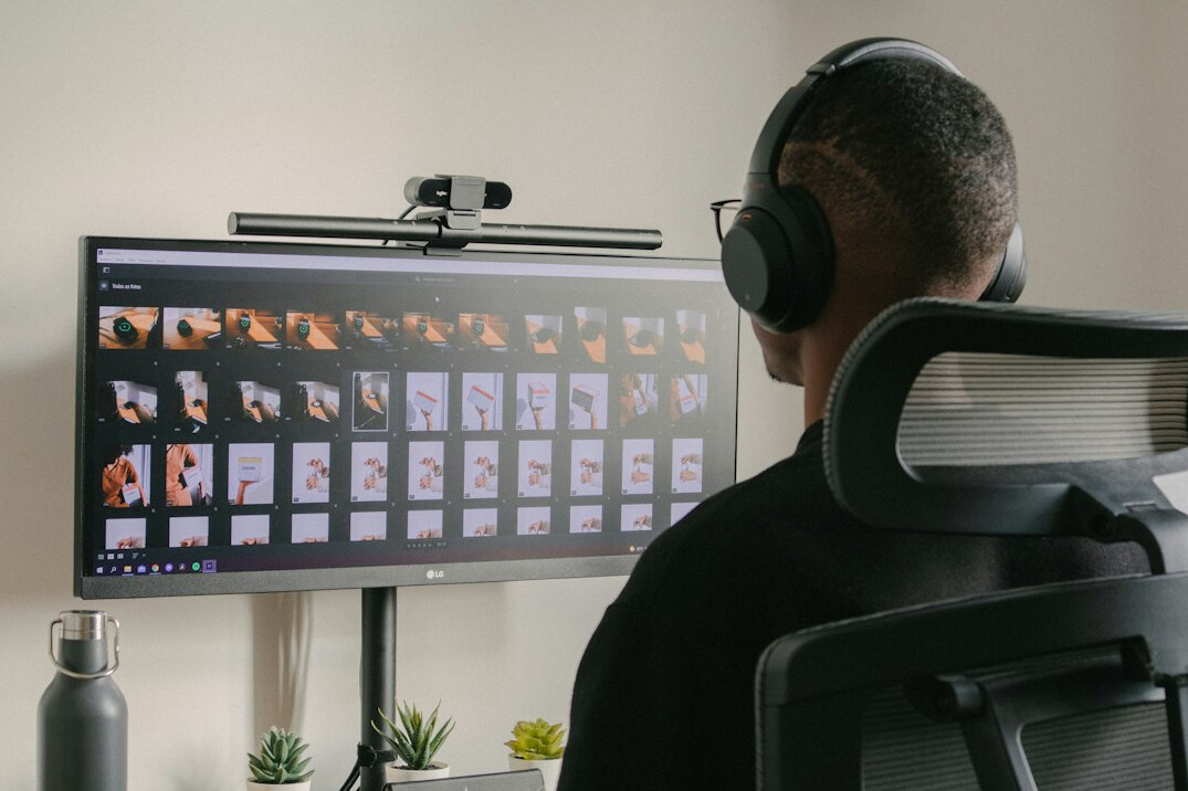 photographer editing video on computer